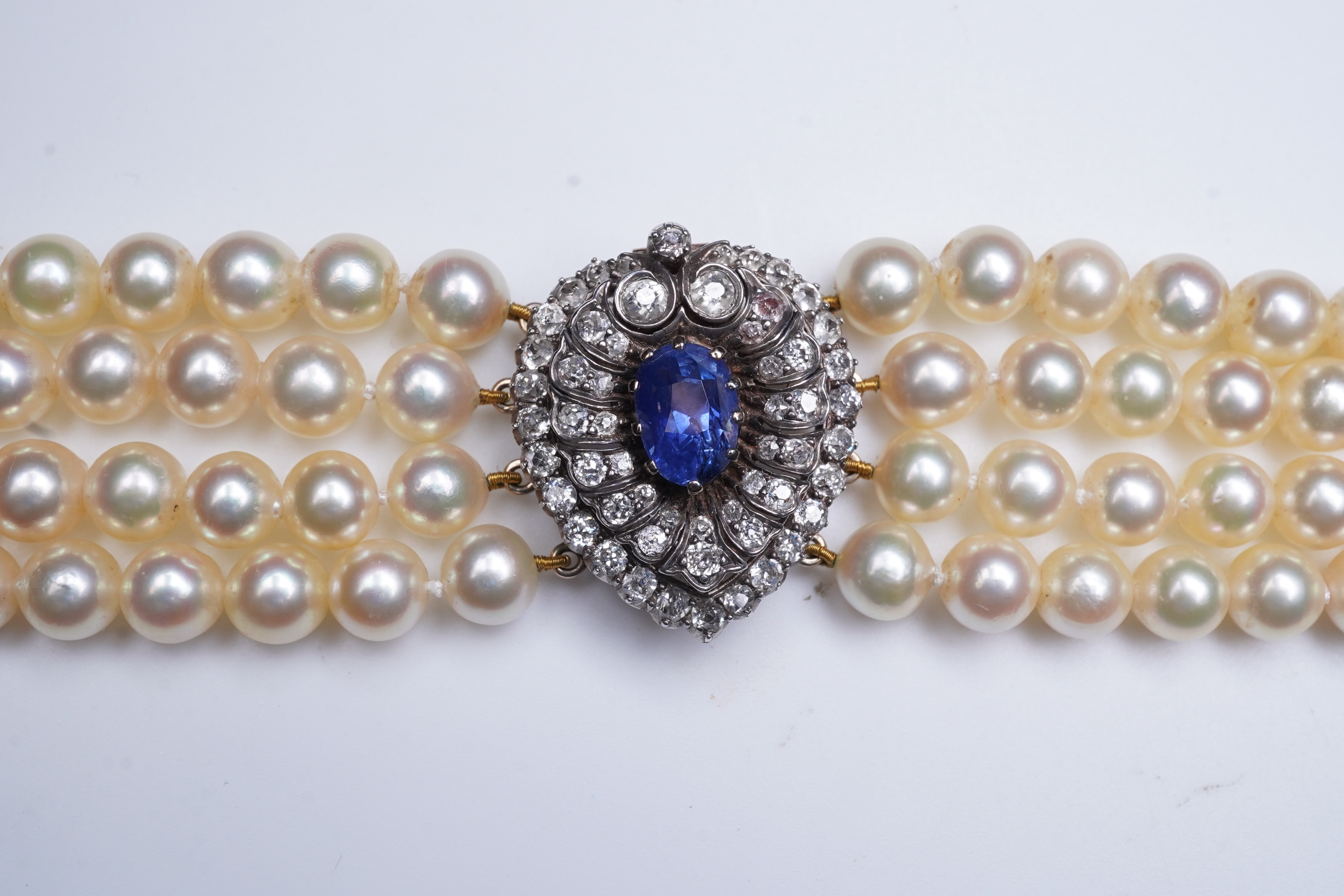 A late Victorian sapphire and diamond brooch and cultured pearl necklace, circa 1900 and later